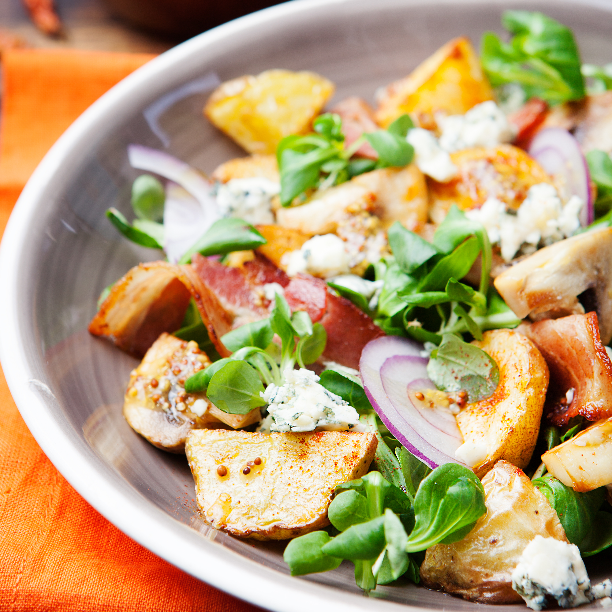 Roasted fingerling potatoes with arugula